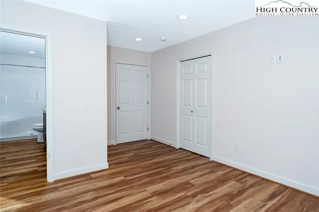a view of a livingroom with wooden floor