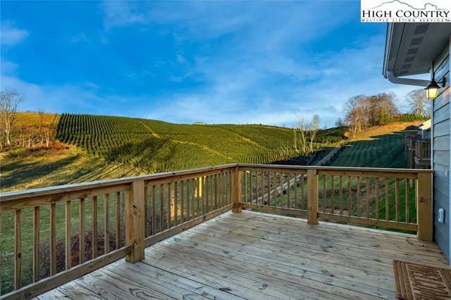 a view of balcony with furniture