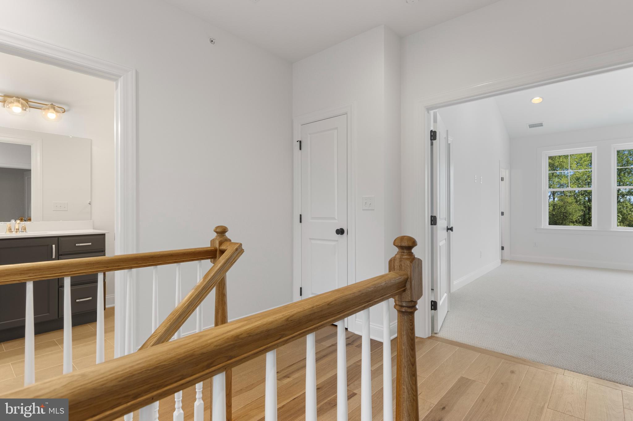 435 Reagans Lane, Unit 124 Chalfont, PA 18914 - Photo 6 of 8 a view of a hallway with windows