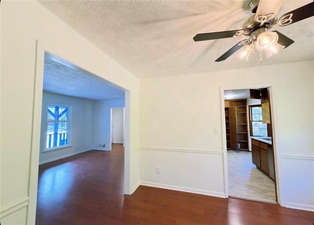 500 Rue De Chateau Stone Mountain, GA 30083 - Photo 8 of 17 wooden floor in an empty room with a window
