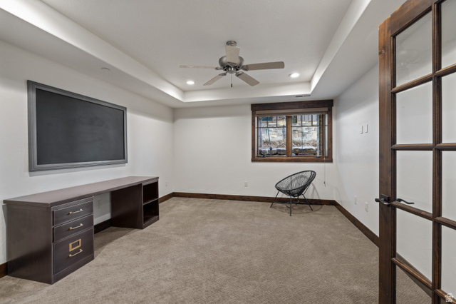 707 Chimney Rock Road, Unit 247 Heber City, UT 84032 - Photo 33 of 64 Unfurnished office featuring light colored carpet, recessed lighting, a ceiling fan, and a raised ceiling