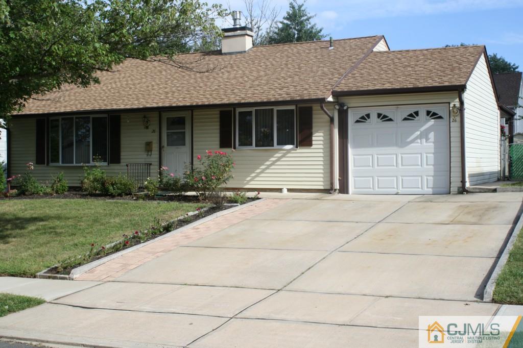 26 Winthrop Road Edison, NJ 08817 - Photo 1 of 25 a front view of a house with garden