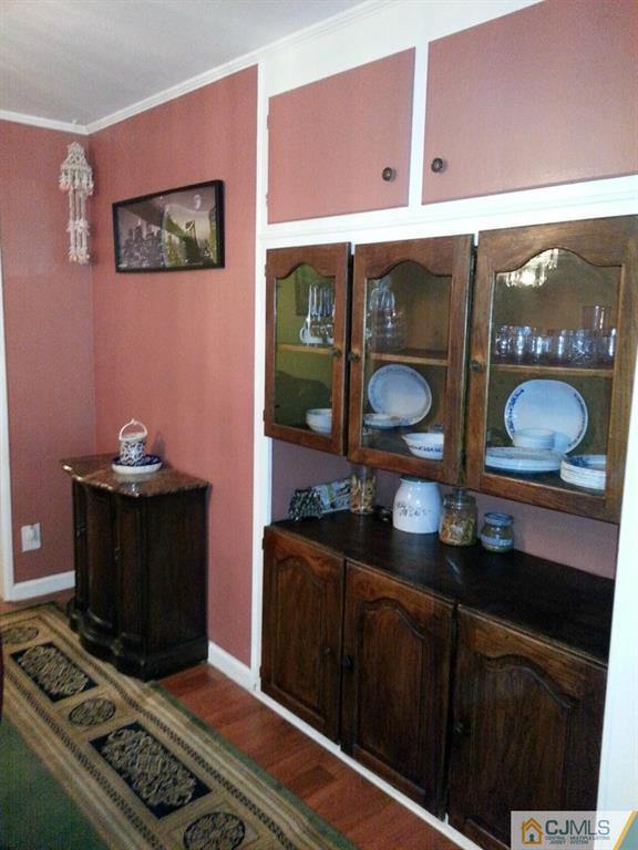 26 Winthrop Road Edison, NJ 08817 - Photo 12 of 25 a kitchen with stainless steel appliances a stove and a microwave