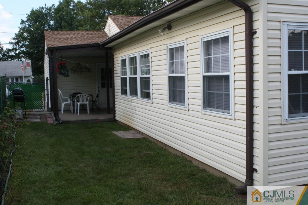 26 Winthrop Road Edison, NJ 08817 - Photo 22 of 25 a view of a house with a backyard