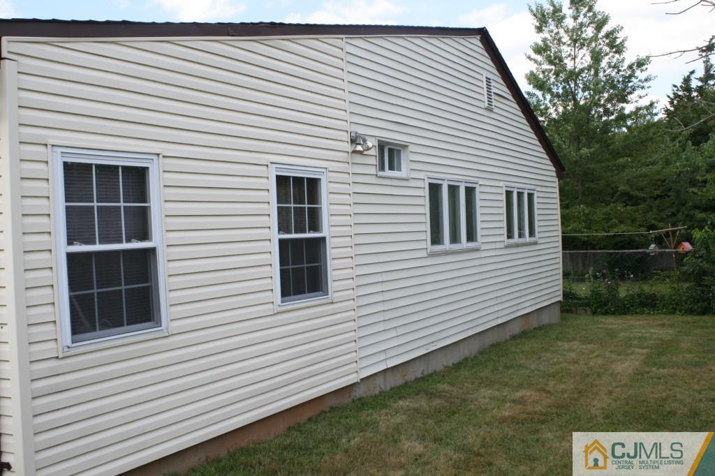 26 Winthrop Road Edison, NJ 08817 - Photo 23 of 25 a view of a house with a yard