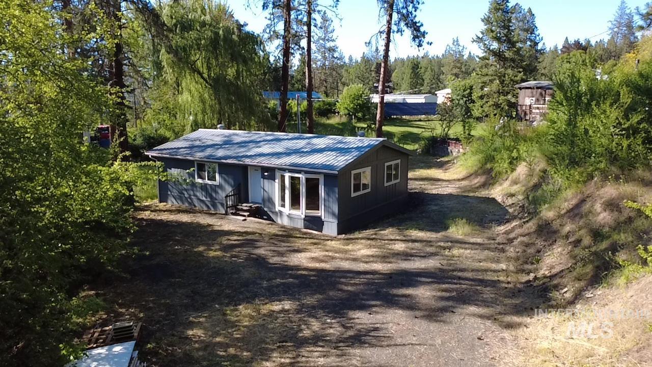 151 View Road Kamiah, ID 83536 - Photo 37 of 49 Single-story residence featuring a gray exterior siding and a corrugated metal roof
