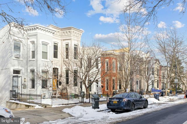 a car parked in front of a building