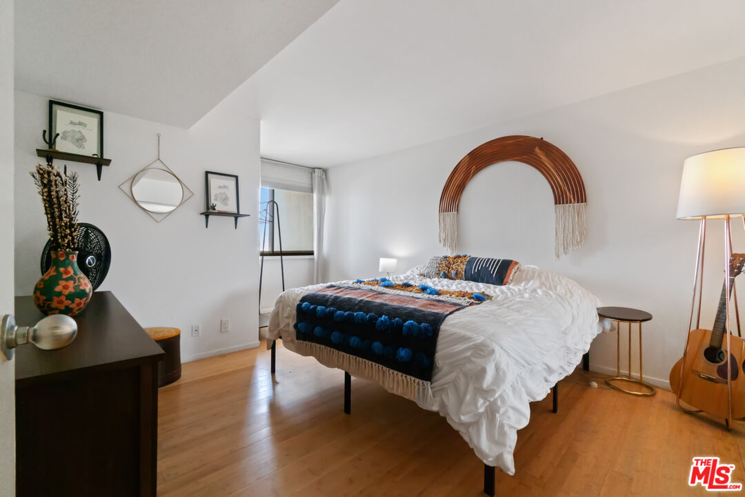 6209 Pacific Avenue, Unit 103 Playa del Rey, CA 90293 - Photo 13 of 40 a bedroom with bed and a closet