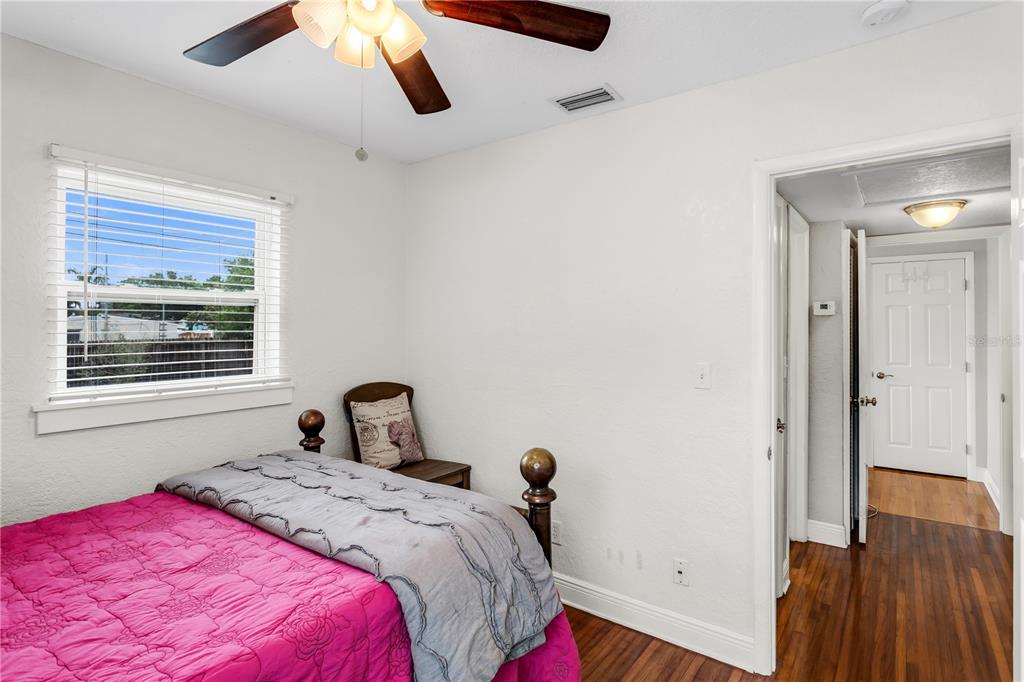 2425 36th Avenue North St. Petersburg, FL 33713 - Photo 22 of 32 a bedroom with a bed and a window