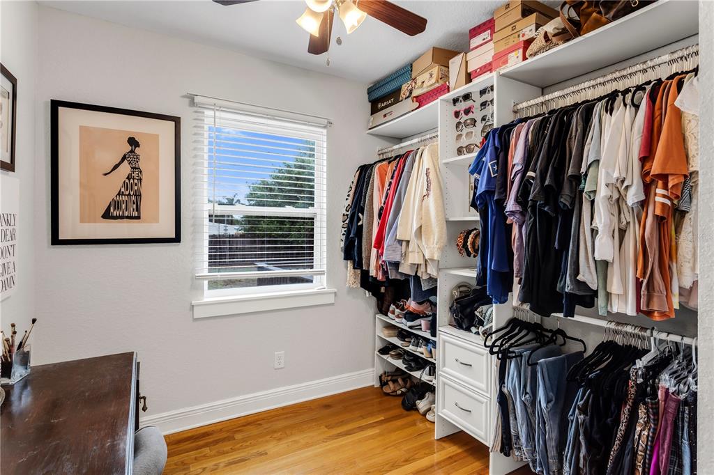 2425 36th Avenue North St. Petersburg, FL 33713 - Photo 24 of 32 a view of walk in closet with clothes and shoes