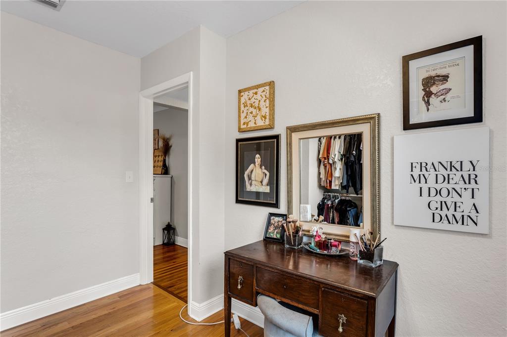 2425 36th Avenue North St. Petersburg, FL 33713 - Photo 25 of 32 a view of a workspace with furniture and wooden floor