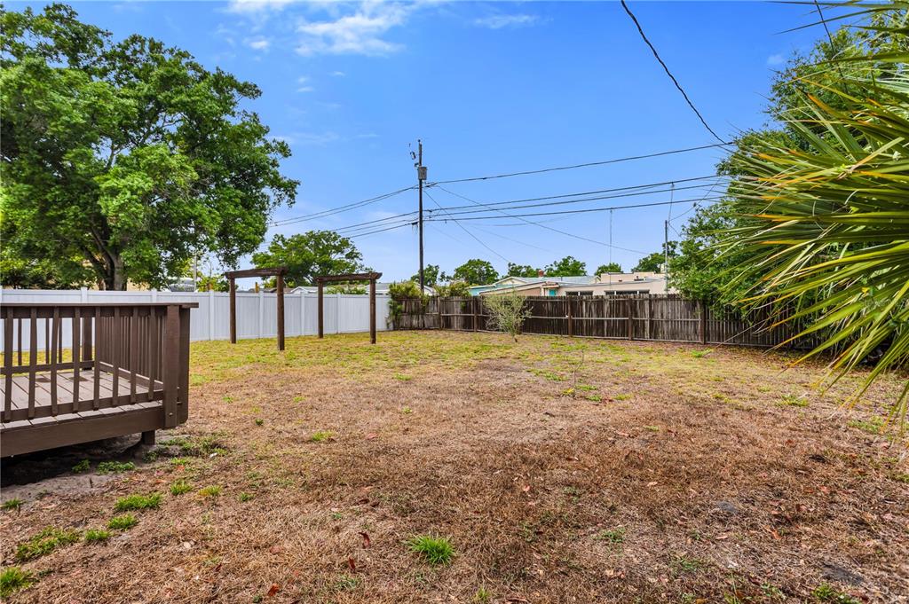 2425 36th Avenue North St. Petersburg, FL 33713 - Photo 28 of 32 a view of a backyard with wooden fence