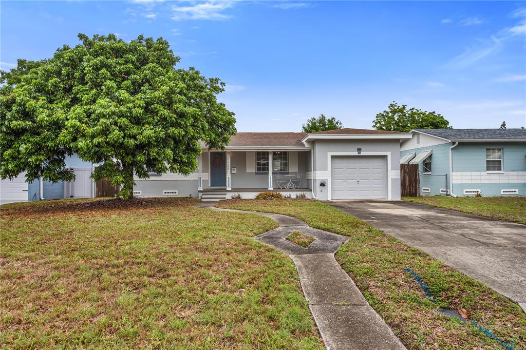2425 36th Avenue North St. Petersburg, FL 33713 - Photo 31 of 32 a front view of a house with a yard