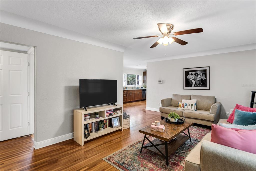 2425 36th Avenue North St. Petersburg, FL 33713 - Photo 5 of 32 a living room with furniture and a flat screen tv