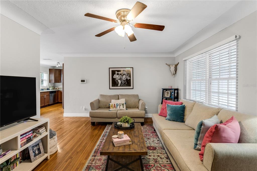2425 36th Avenue North St. Petersburg, FL 33713 - Photo 6 of 32 a living room with furniture and a flat screen tv