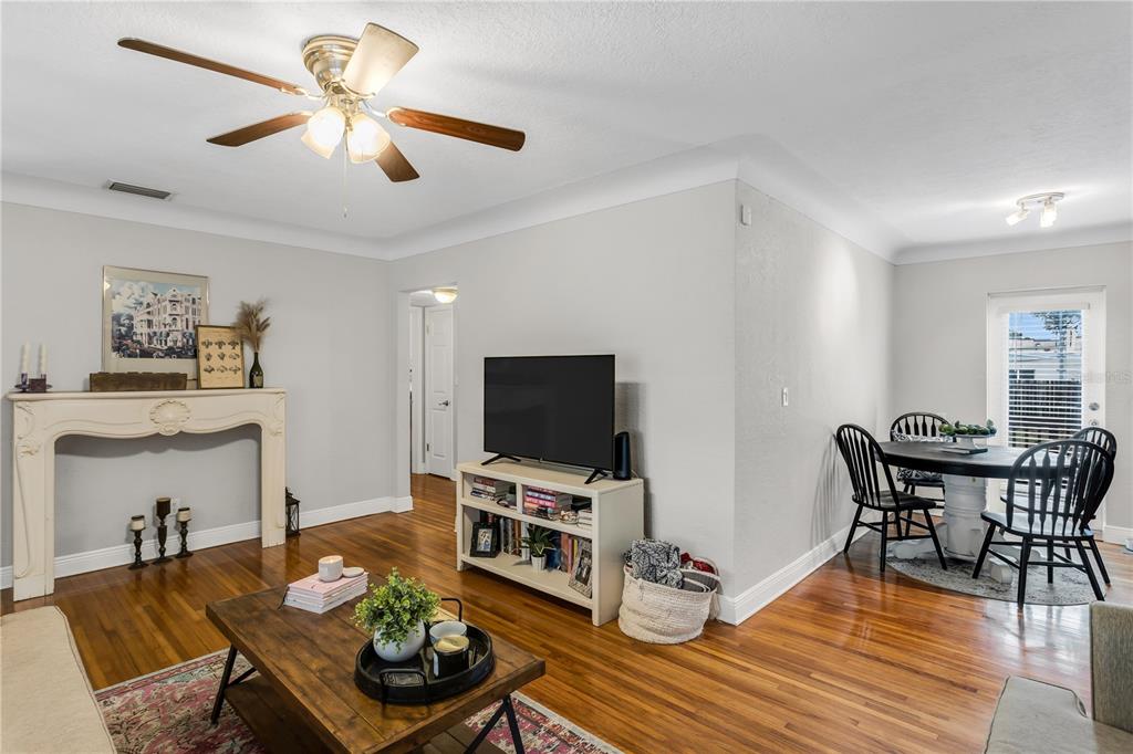 2425 36th Avenue North St. Petersburg, FL 33713 - Photo 9 of 32 a living room with furniture and a flat screen tv