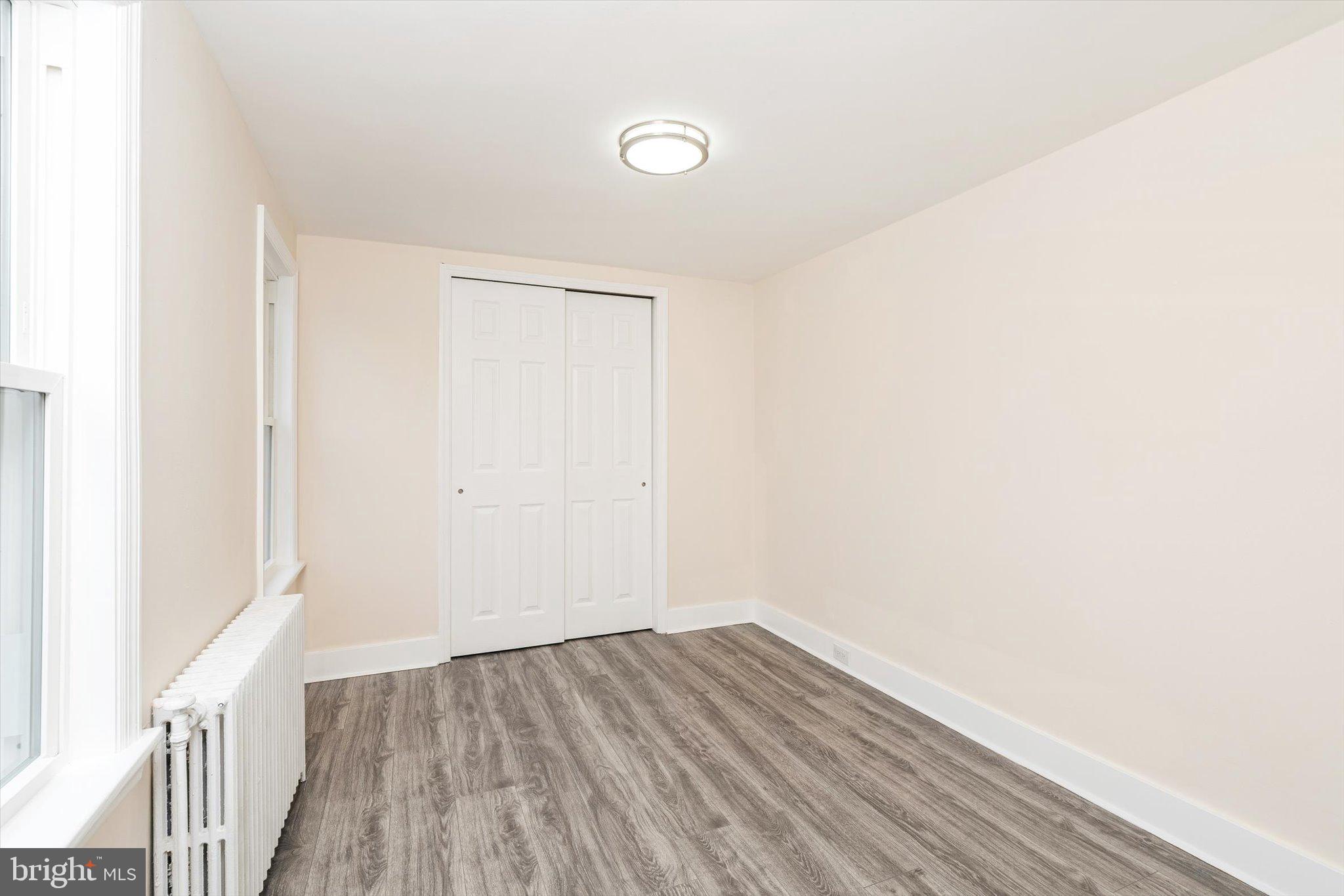 542 Mercerville-Edinburg Road Trenton, NJ 08619 - Photo 20 of 31 a view of a room with wooden floor