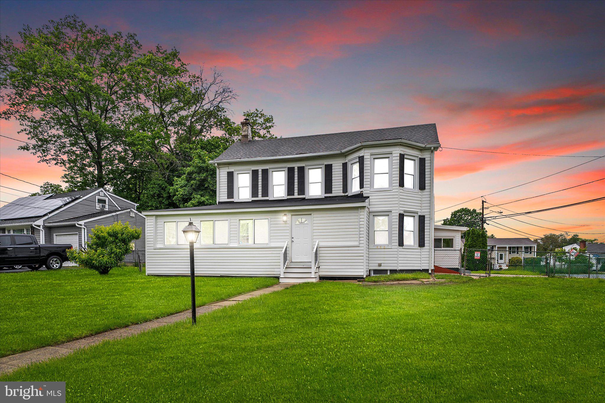 542 Mercerville-Edinburg Road Trenton, NJ 08619 - Photo 2 of 31 a front view of a house with a yard and green space