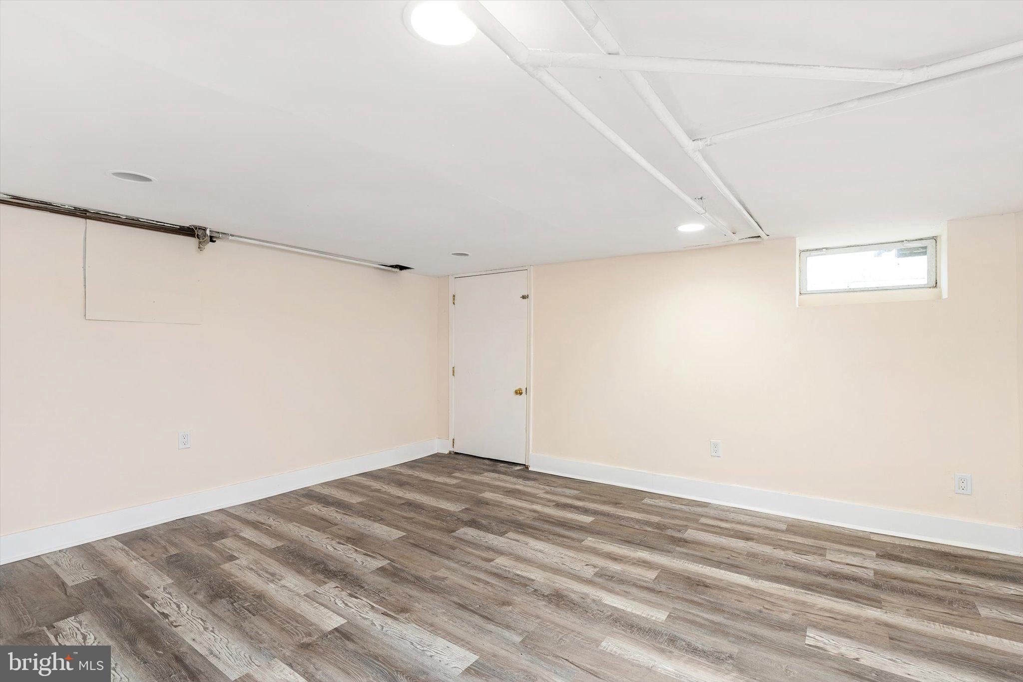 542 Mercerville-Edinburg Road Trenton, NJ 08619 - Photo 24 of 31 a view of a room with wooden floor