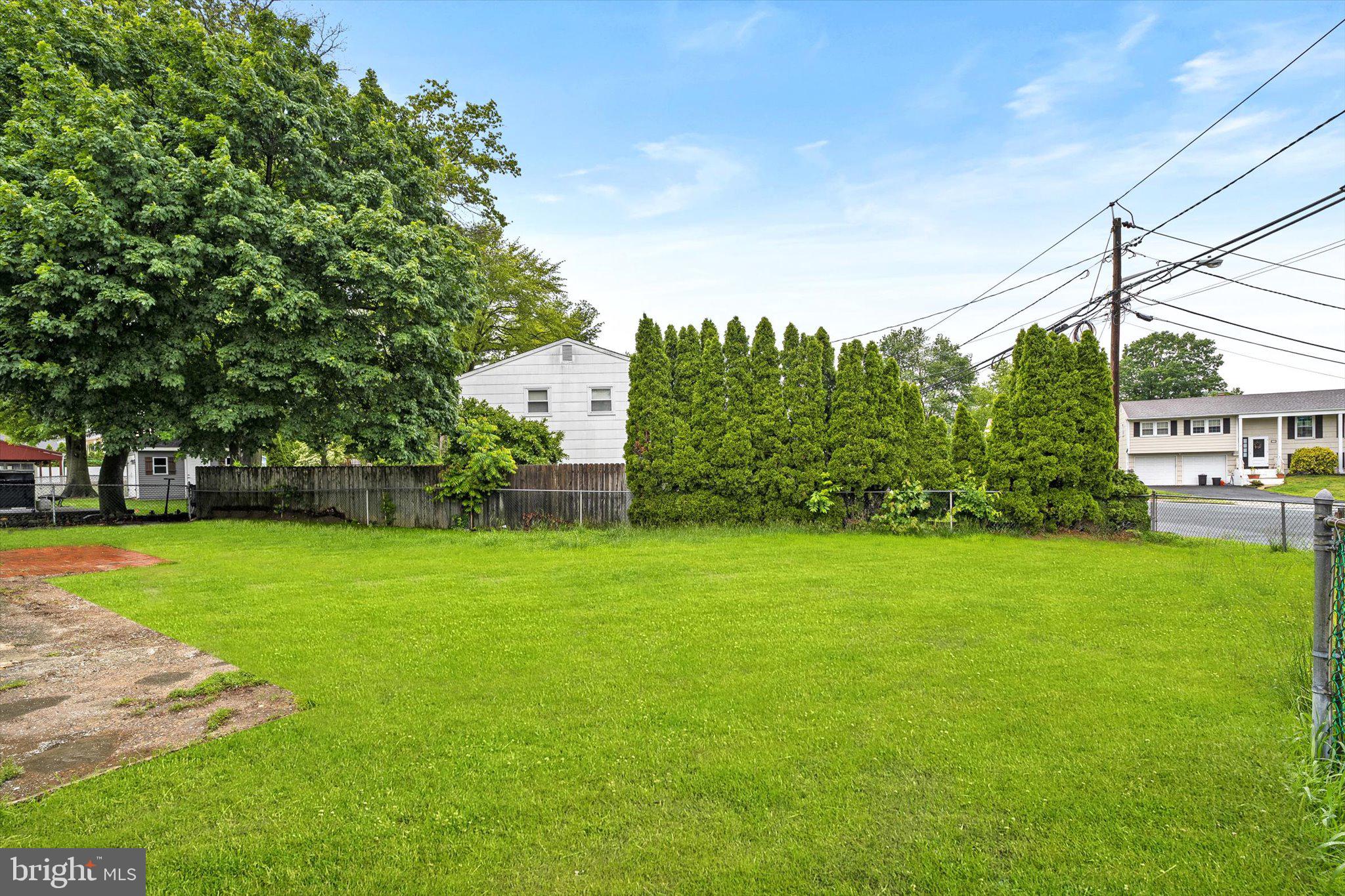 542 Mercerville-Edinburg Road Trenton, NJ 08619 - Photo 28 of 31 a view of a park with a trees in the background