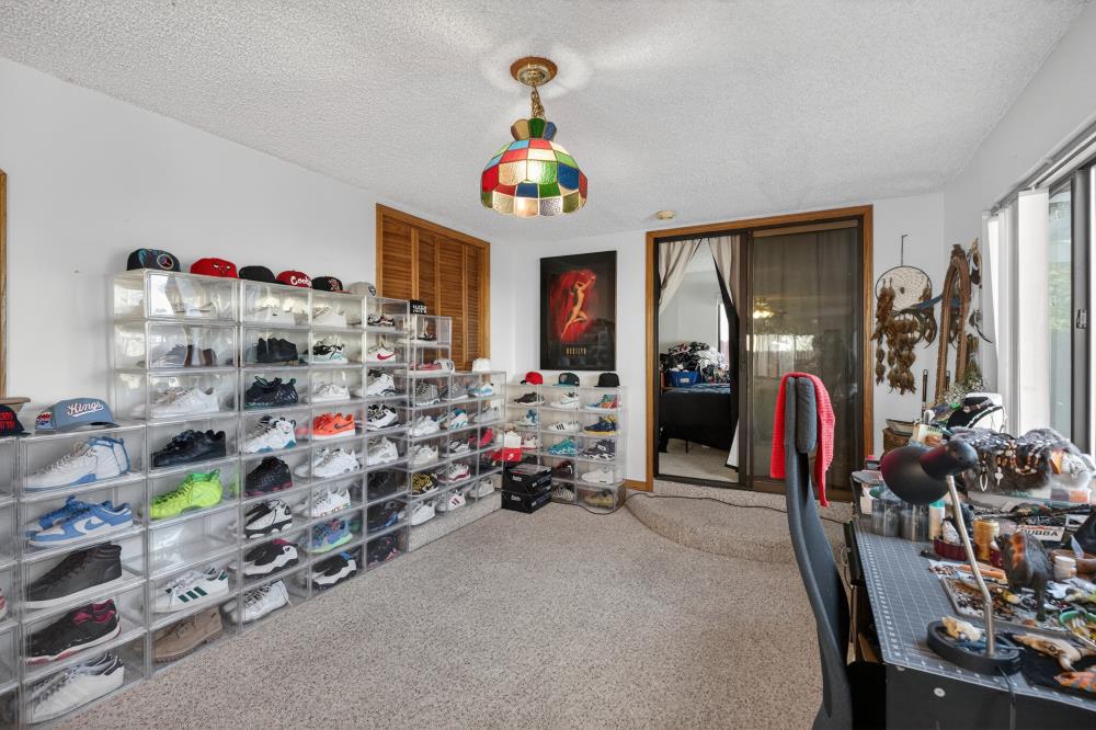 10649 Campana Way Rancho Cordova, CA 95670 - Photo 17 of 40 a living room with lots of furniture and a chandelier