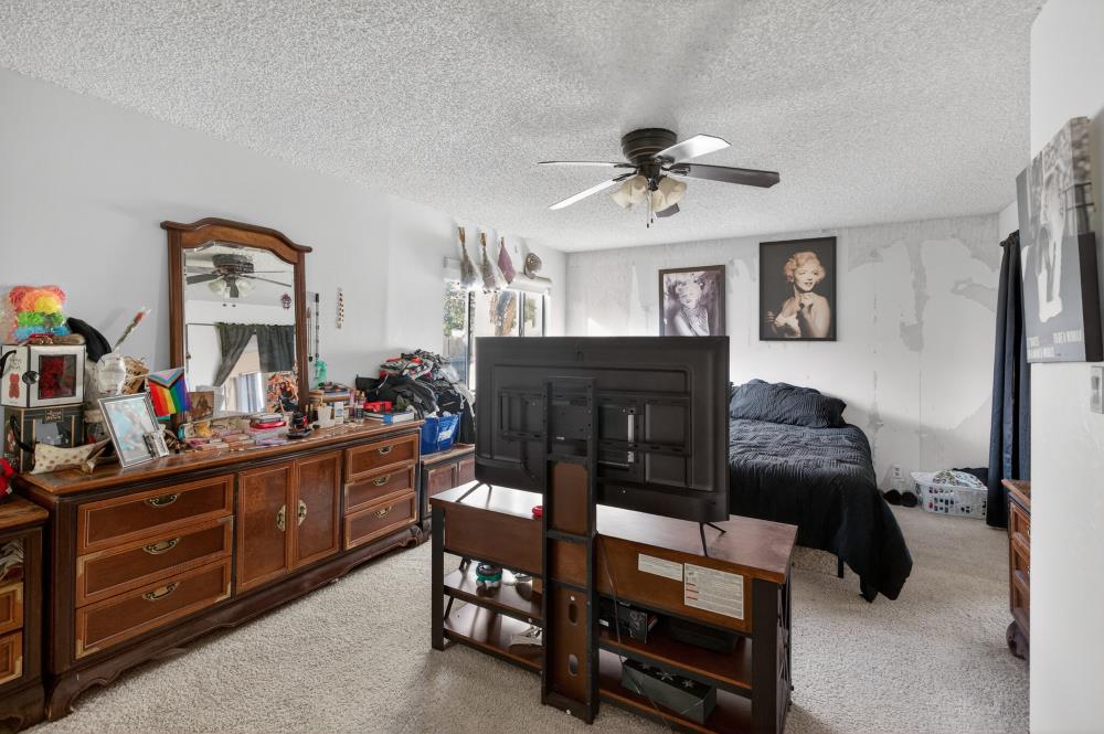10649 Campana Way Rancho Cordova, CA 95670 - Photo 20 of 40 a bedroom with furniture and a mirror