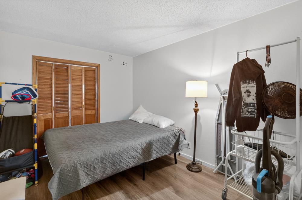 10649 Campana Way Rancho Cordova, CA 95670 - Photo 26 of 40 a bedroom with a bed a dresser and a window