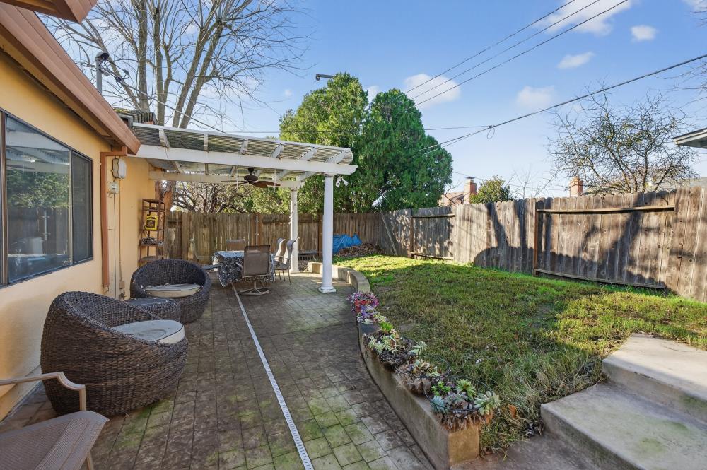 10649 Campana Way Rancho Cordova, CA 95670 - Photo 35 of 40 a view of a patio with couches table and chairs and potted plants