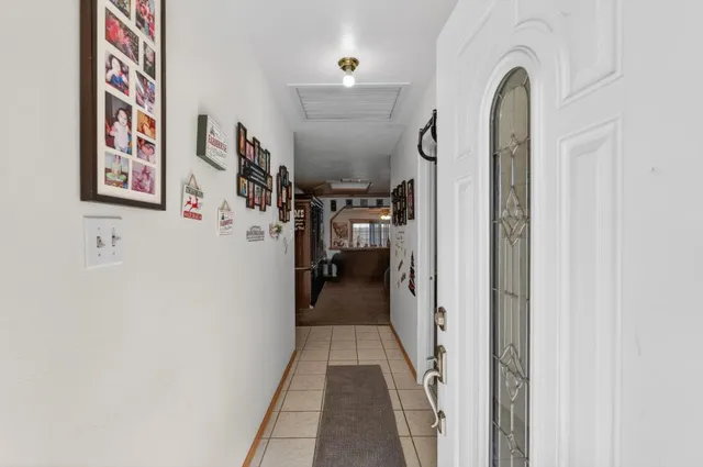 a view of a hallway with closet