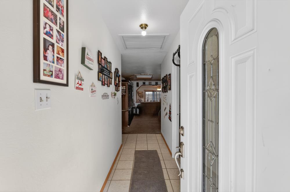 10649 Campana Way Rancho Cordova, CA 95670 - Photo 4 of 40 a view of a hallway with closet