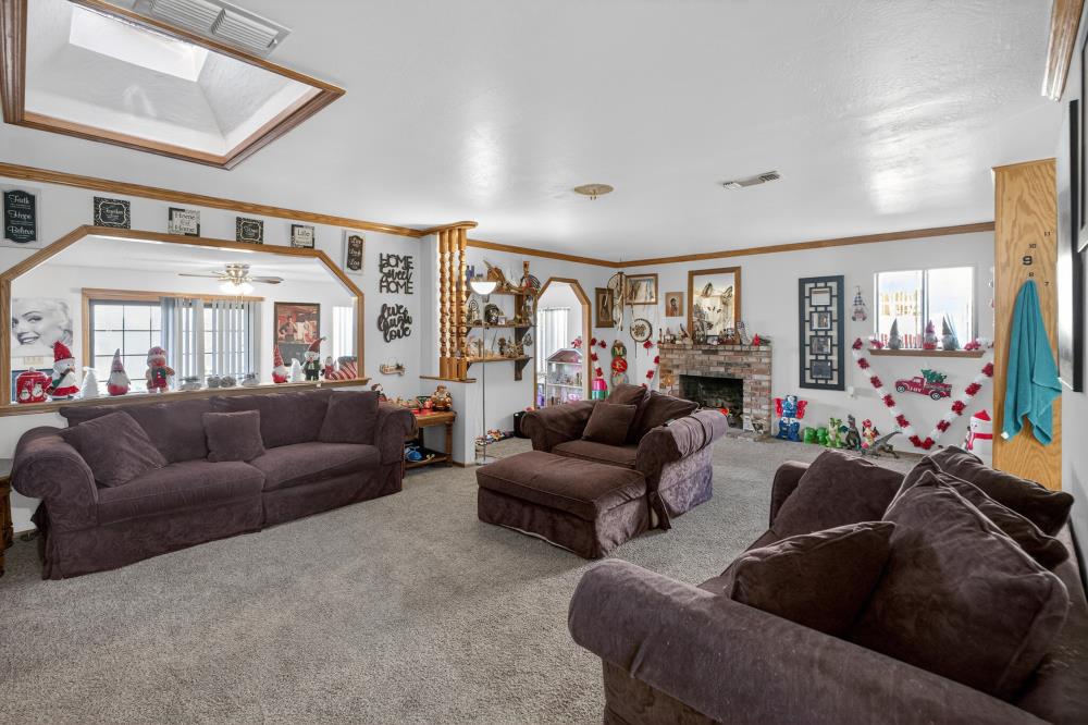 10649 Campana Way Rancho Cordova, CA 95670 - Photo 5 of 40 a living room with furniture and a large window
