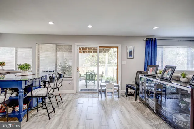 a workspace with furniture window and wooden floor