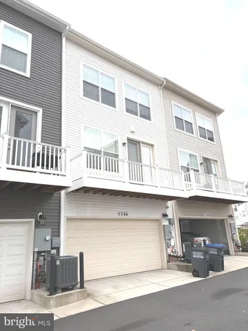 a front view of a building with balcony