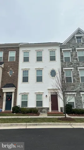a view of a building with a street