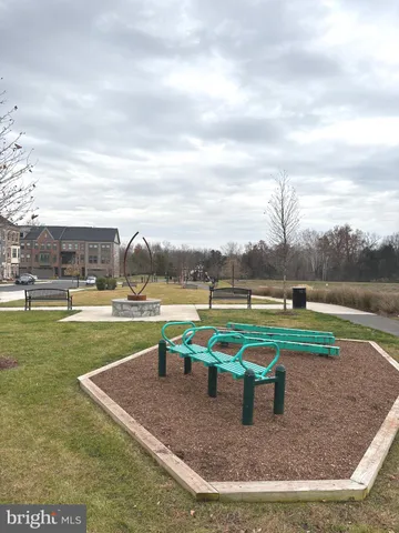 a view of a swimming pool with a yard