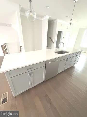a bathroom with a double vanity sink and mirror