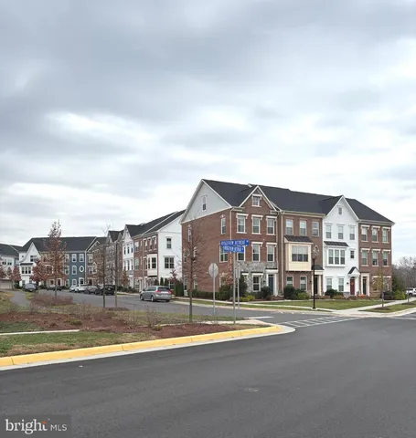a view of houses with a city view