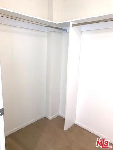 a view of small space with racks on the wall