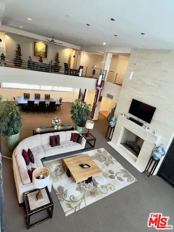 a lobby with furniture and a large window