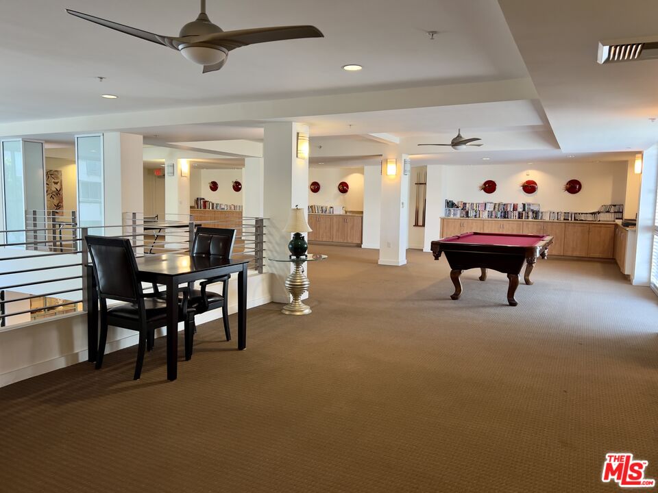 267 San Pedro Street, Unit 221 Los Angeles, CA 90012 - Photo 40 of 45 a view of a dining room with furniture and chandelier