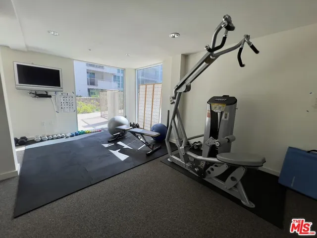 a view of a garage with cars