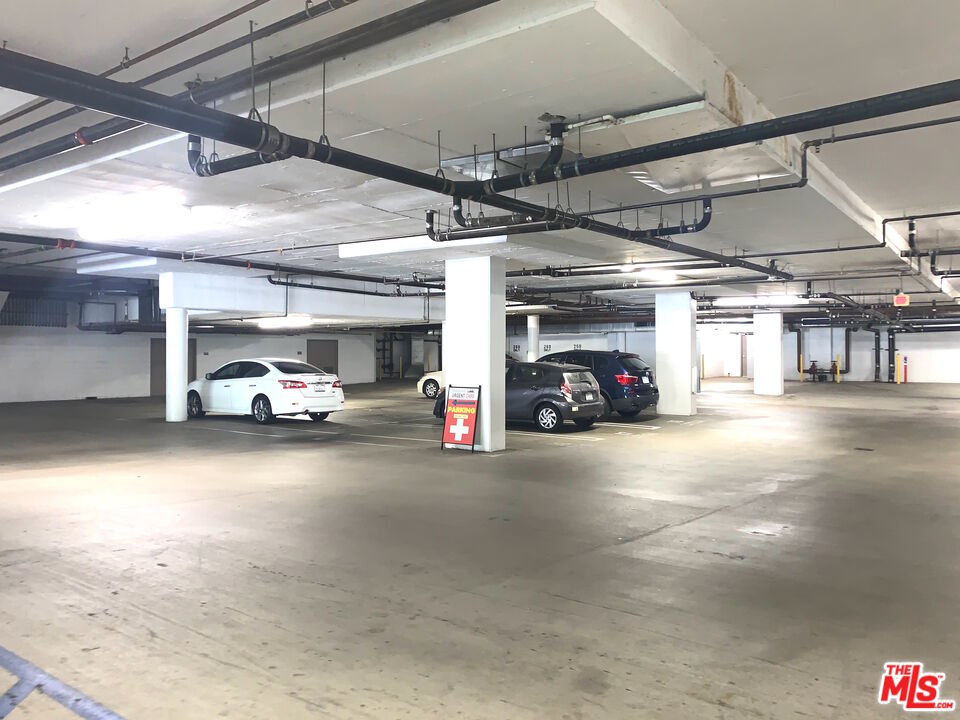 267 San Pedro Street, Unit 221 Los Angeles, CA 90012 - Photo 45 of 45 a view of parking garage with cars