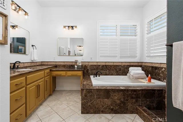 a bathroom with a sink and a bathtub