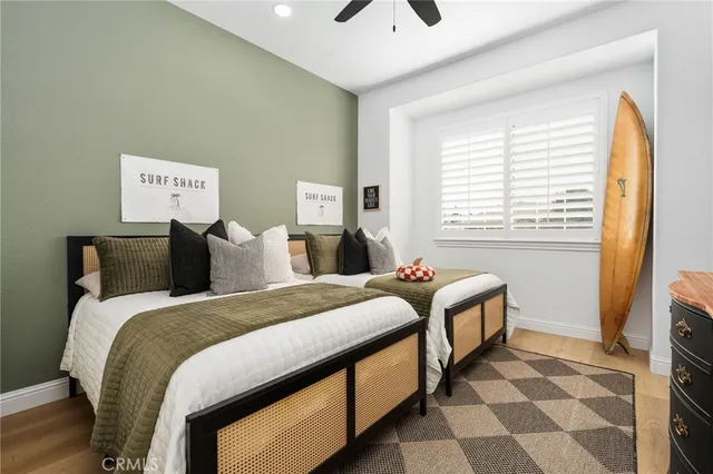 a bed room with a bed and a tv