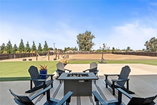 a view of a lake with furniture