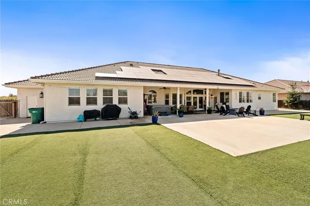 a view of house with swimming pool