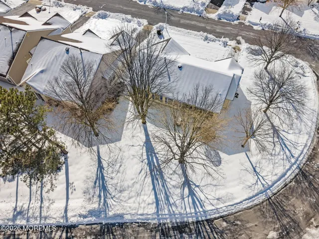 a view of a backyard of the house
