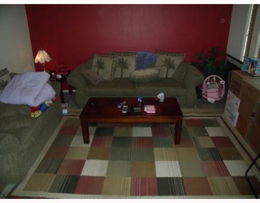 1228 Sacramento Portland, TX 78374 - Photo 3 of 4 a living room with a rug