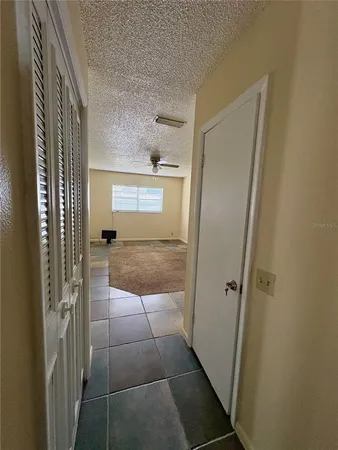 a bathroom with a glass door shower