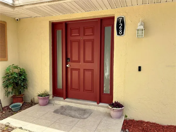a view of a entryway door of the house